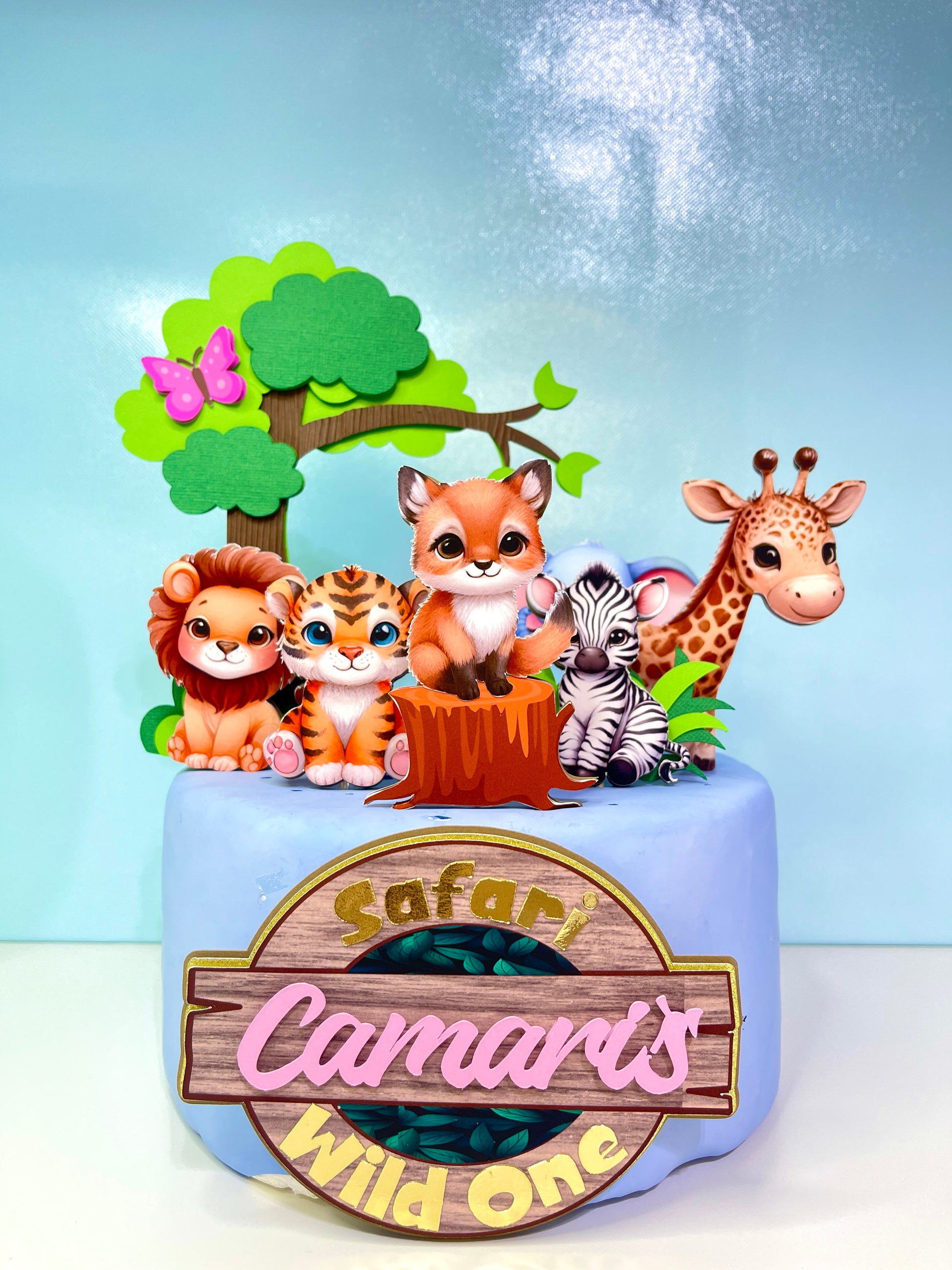 "Custom Wild One Cake Topper with Safari Animals by BeePaperParty" "Handcrafted Wild One Birthday Cake Decor with Jungle Animals" "Premium Quality Wild One Party Cake Topper featuring Safari Wildlife" "Colorful Jungle Theme Wild One Cake Topper by BeePaperParty" "Unique BeePaperParty Wild One Cake Topper with Safari Animals"