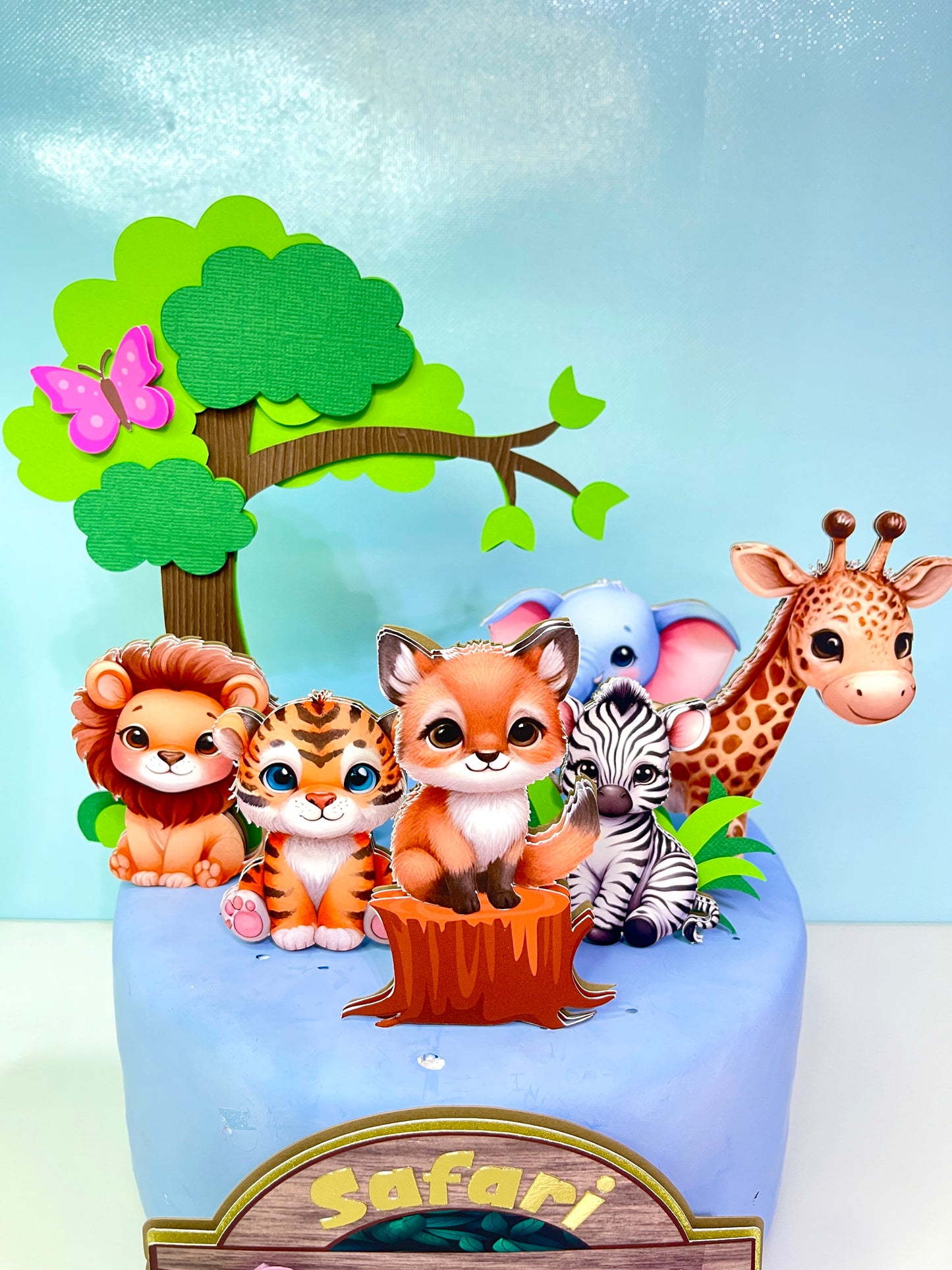 "Custom Wild One Cake Topper with Safari Animals by BeePaperParty" "Handcrafted Wild One Birthday Cake Decor with Jungle Animals" "Premium Quality Wild One Party Cake Topper featuring Safari Wildlife" "Colorful Jungle Theme Wild One Cake Topper by BeePaperParty" "Unique BeePaperParty Wild One Cake Topper with Safari Animals"